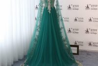 Wedding dress with emerald green accents